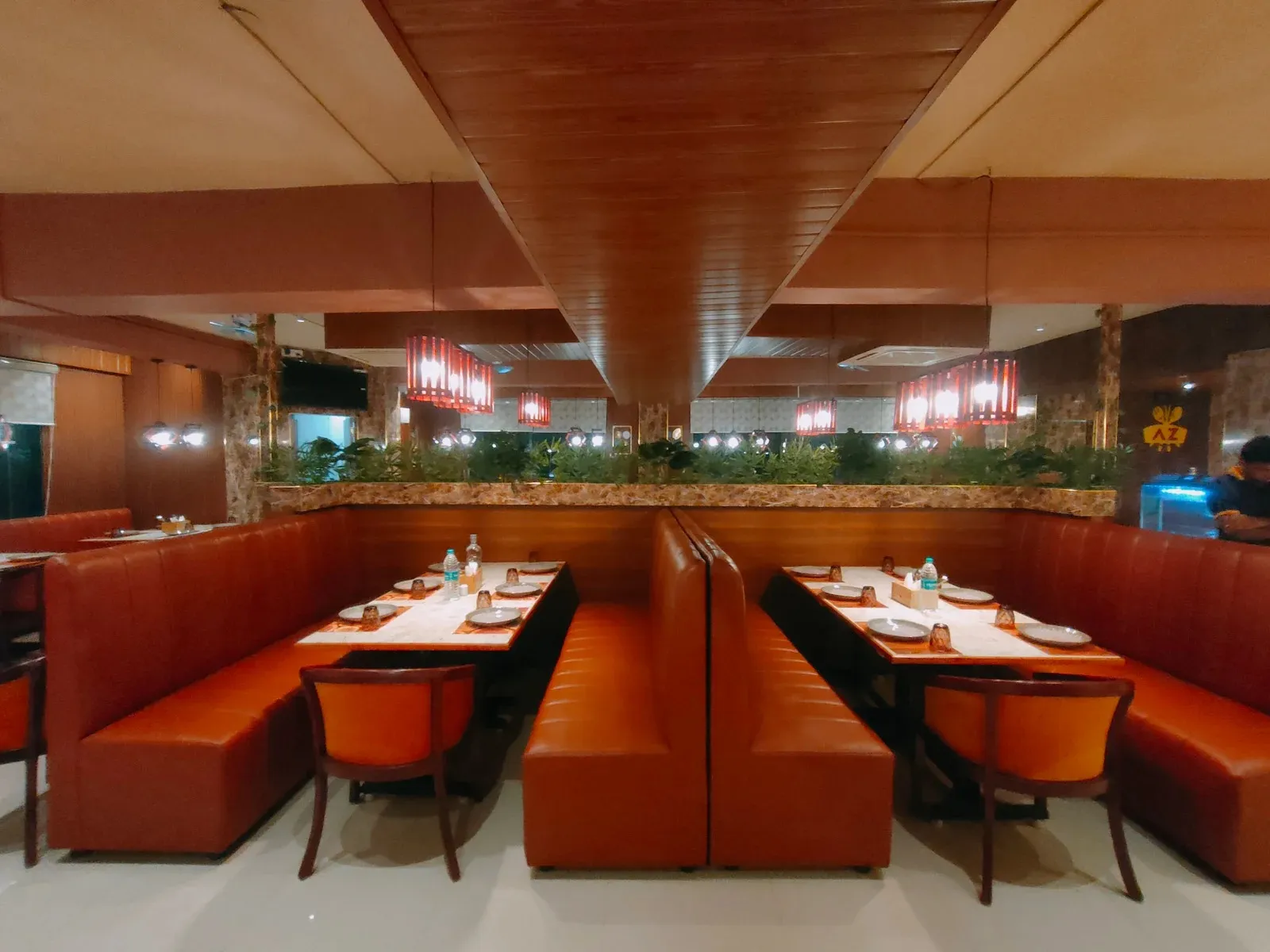 Oriental-Themed Restaurant Interior with Wooden Slat Wall & Booth Seating Luxury Hotel Lobby Design Desk and Decor 
