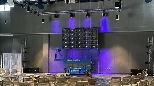 Large Auditorium/Event Hall with Tiered Theatre Seating Auditorium/Event Hall Design Desk and Decor 