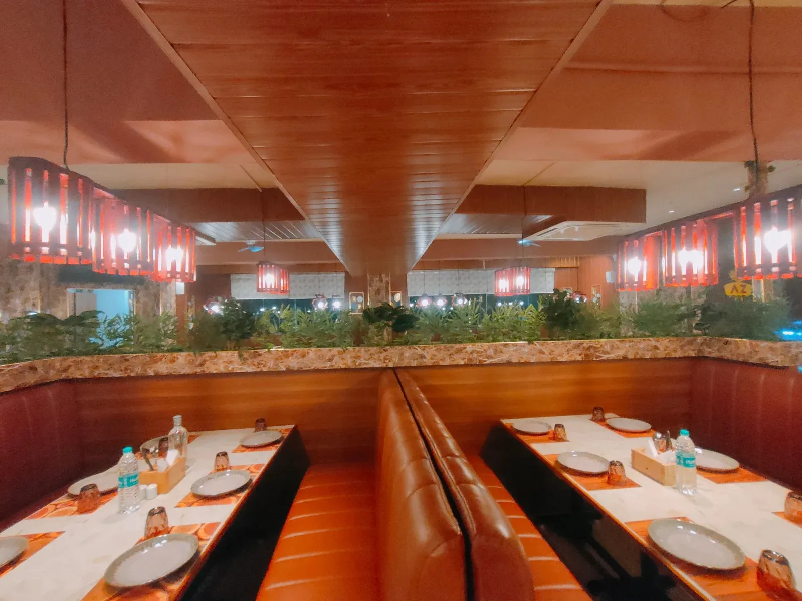 Oriental-Themed Restaurant Interior with Wooden Slat Wall & Booth Seating Luxury Hotel Lobby Design Desk and Decor 