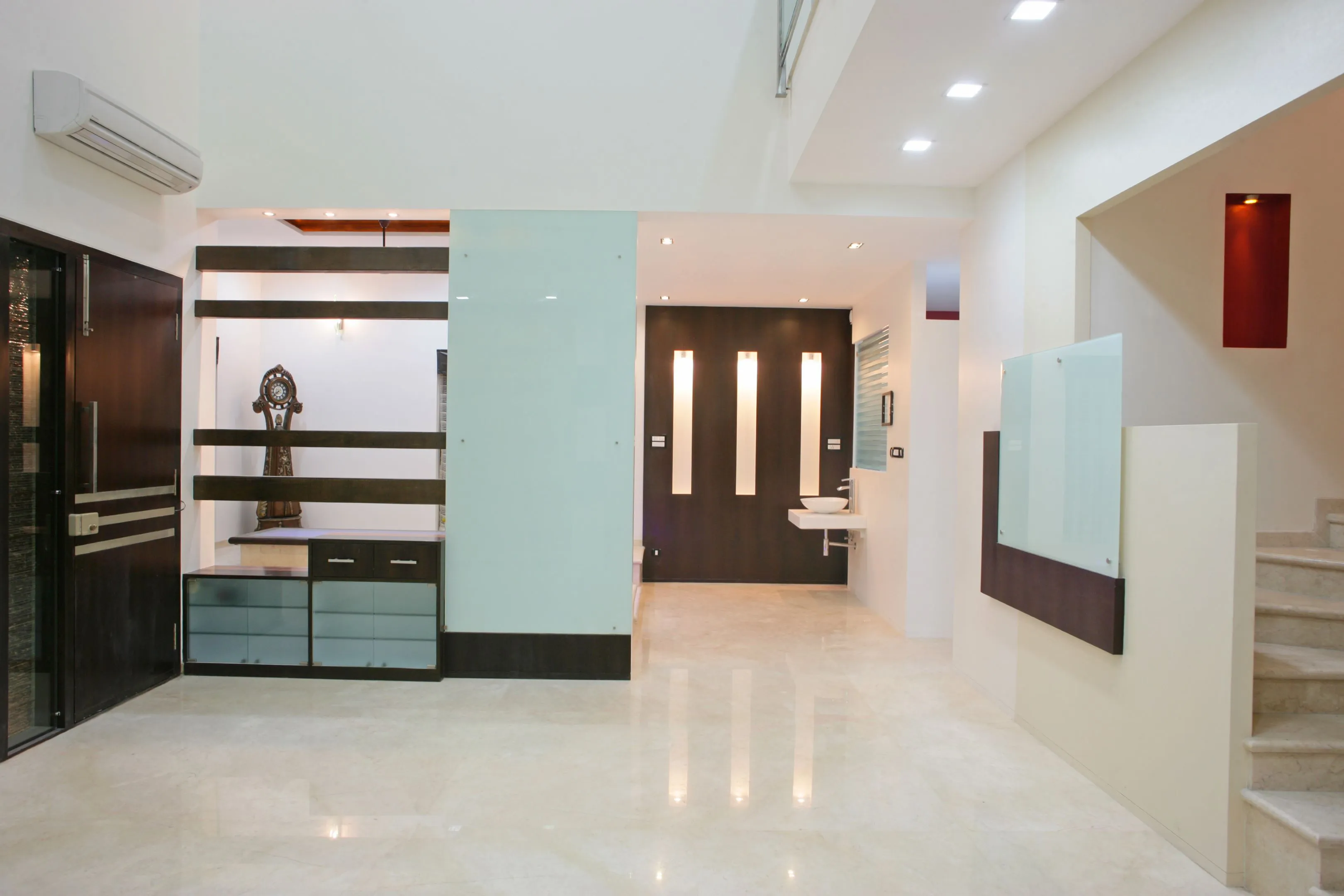 Double-Height Foyer with Grandfather Clock Display Console