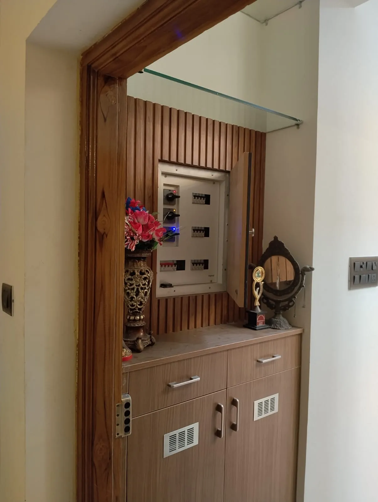 Foyer Solutions Custom Shoe Cabinet with Integrated Electrical DB Concealment and Fluted Wood Accents | Shoe Racks Interior Design by Desk & Decor