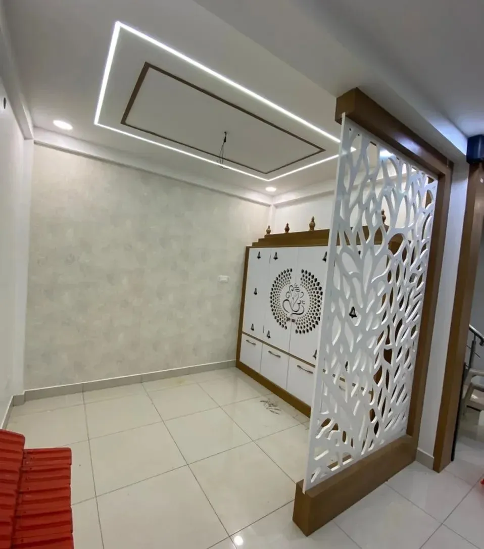 White Jaali-Cut Pooja Unit with Decorative Partition Screen