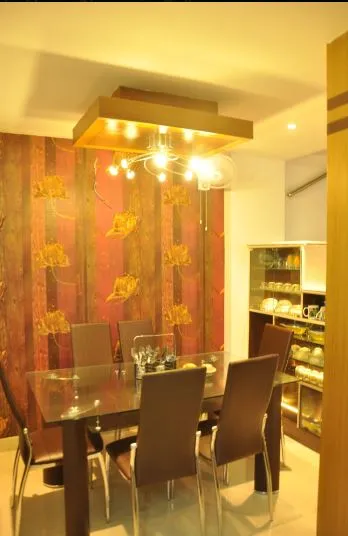 Dining Room with Leaf-Pattern Wallpaper and Box Ceiling Chandelier