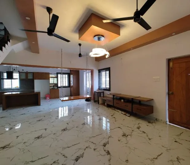 Open-Plan Living Room with Wooden Swing & Marble Flooring