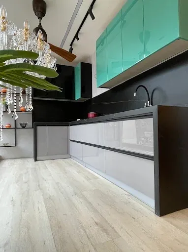Modern Kitchen with Turquoise Glossy Overhead Cabinets