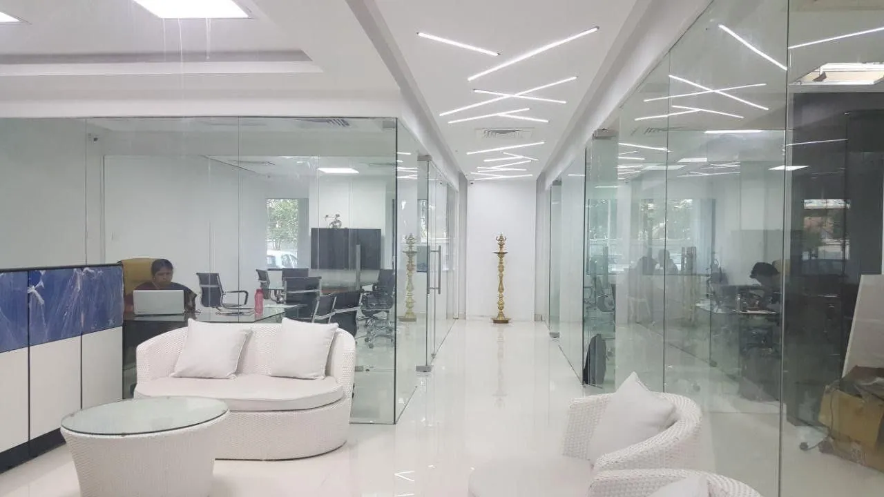 Premium Veneer-Finish Oval Table with Ergonomic Leather Seating and Integrated Ceiling Acoustic Detailing | Interior Interior Design by Desk & Decor
