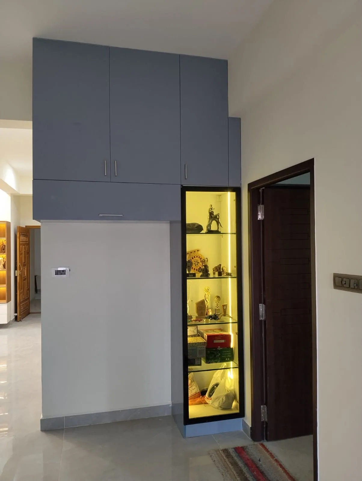 Modern Minimalist Floor-to-Ceiling Built-in Crockery Unit with Profile-Lit Glass Showcase | Dining Interior Design by Desk & Decor