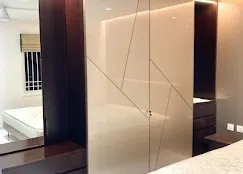 Bedroom with High-Gloss Geometric Wardrobe