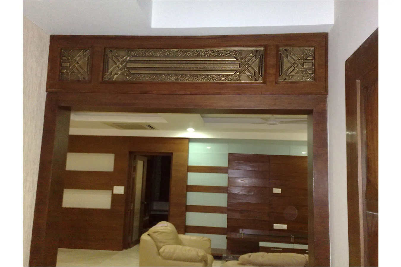 Living Room with Carved Wooden Entrance Frame