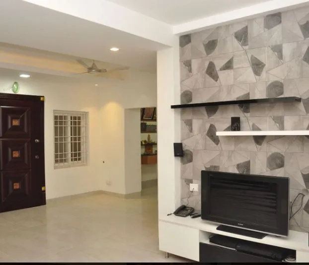 Living Room with Geometric Tile TV Feature Wall