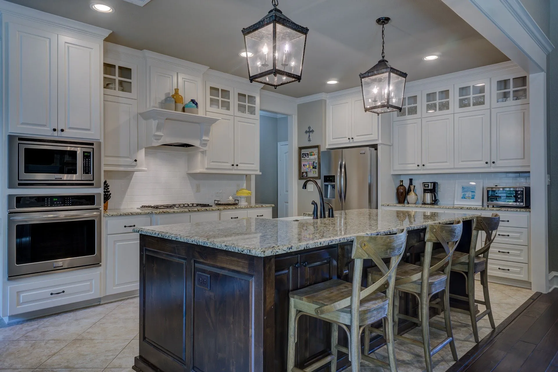 Traditional White Kitchen with Dark Wood Island