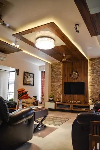 Living Room with Wooden False Ceiling & Stone Cladding TV Wall
