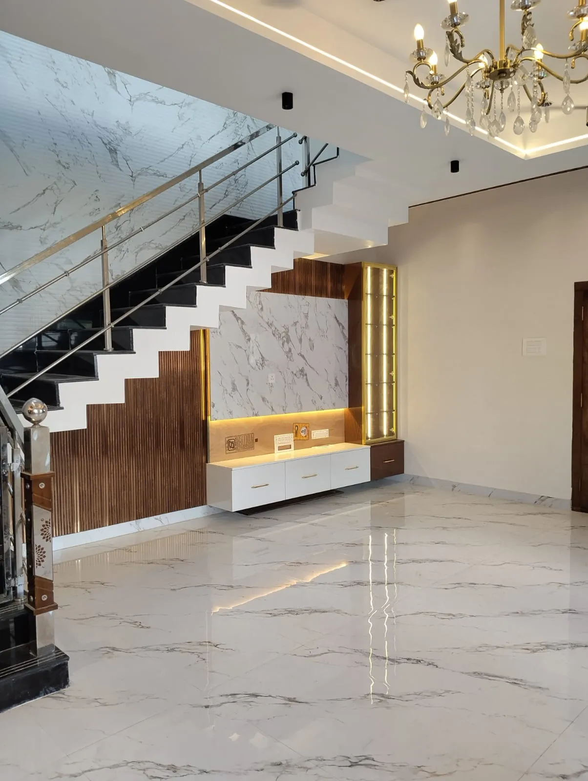 Modern Under-Stair TV Unit with Marble Panel Backing | Interior Interior Design by Desk & Decor