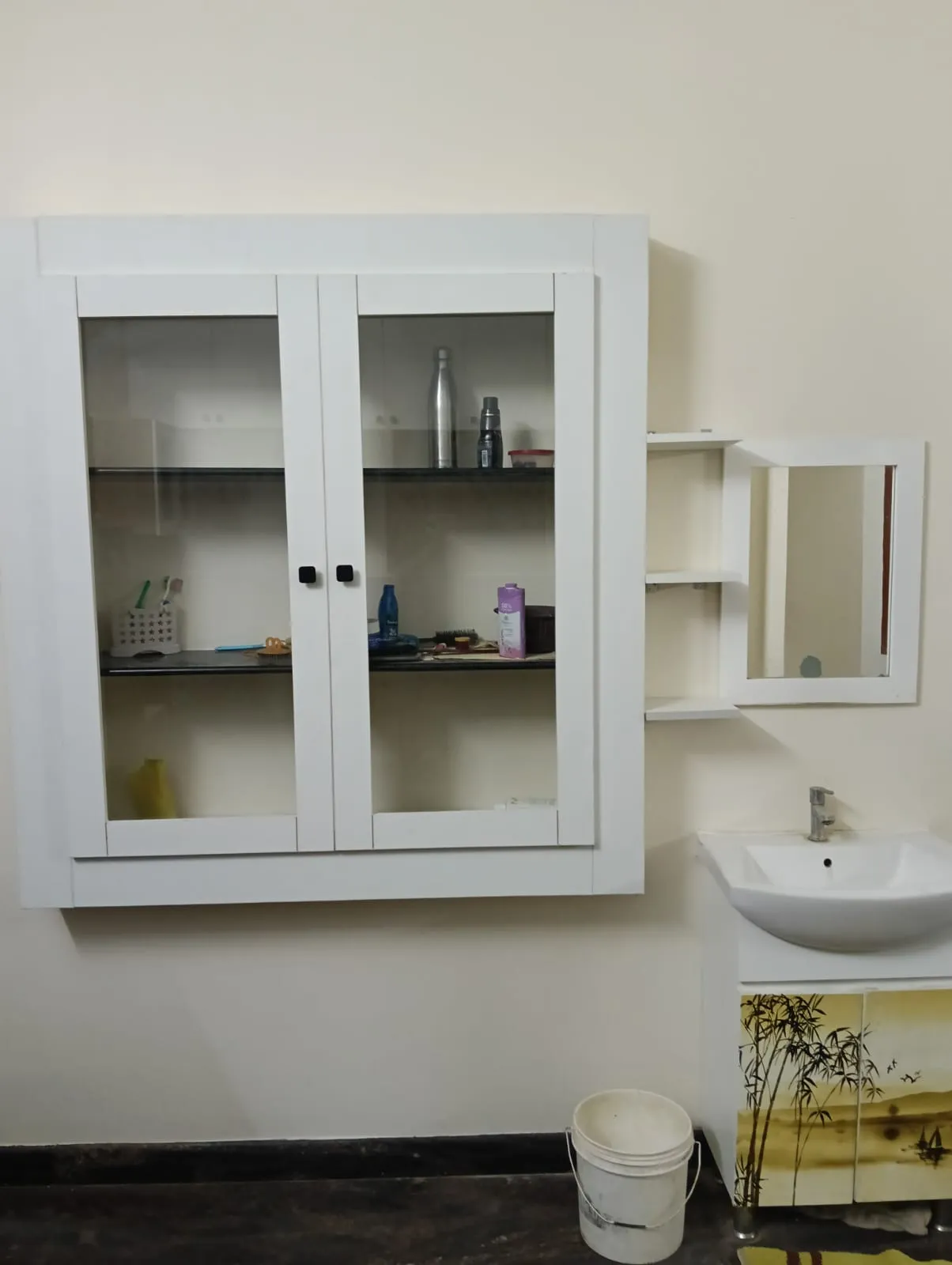 white wall mounted cabinat | Cabinets & Storage Interior Design by Desk & Decor
