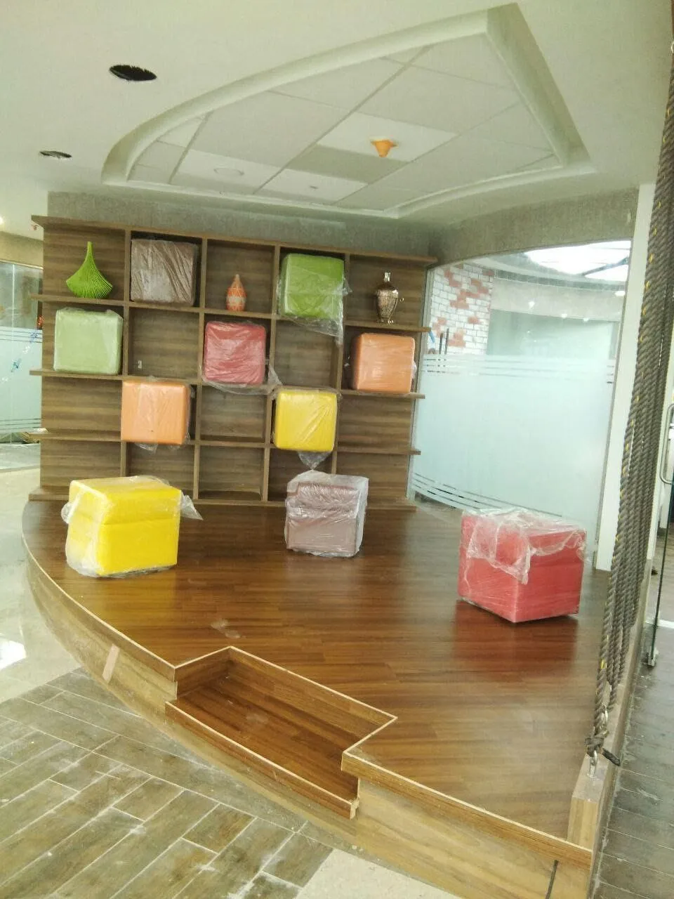 Industrial Showroom Gallery with Modern Reception and Technical Component Display | Interior Interior Design by Desk & Decor