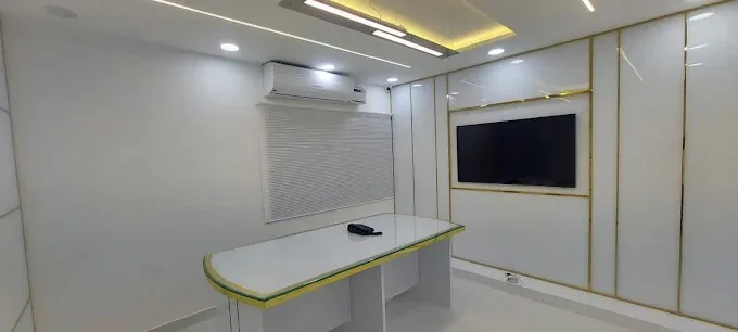 Minimalist White Office Cabin with Gold Trim Paneling