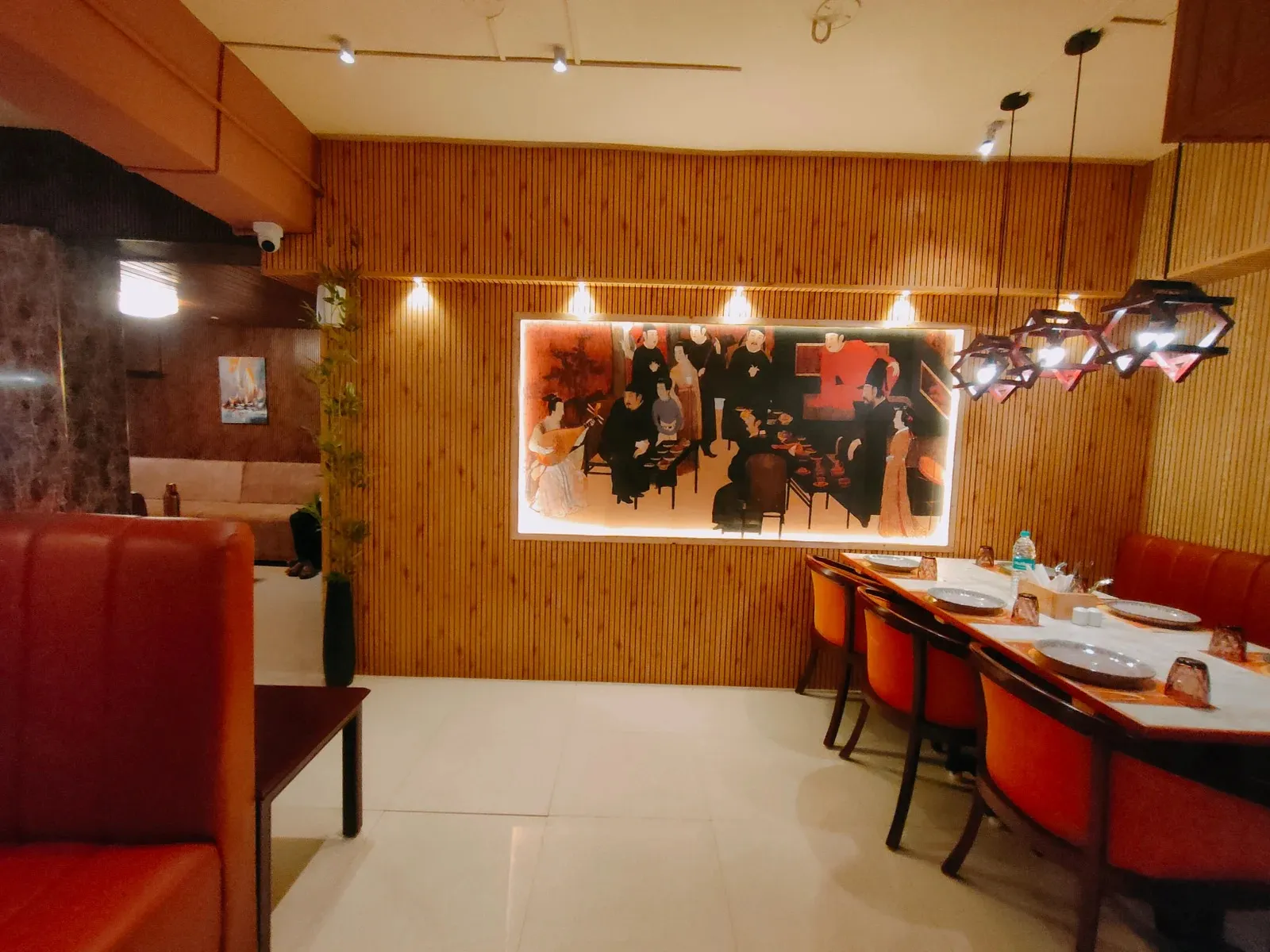 Oriental-Themed Restaurant Interior with Wooden Slat Wall & Booth Seating with Luxury Hotel Lobby Design Desk and Decor