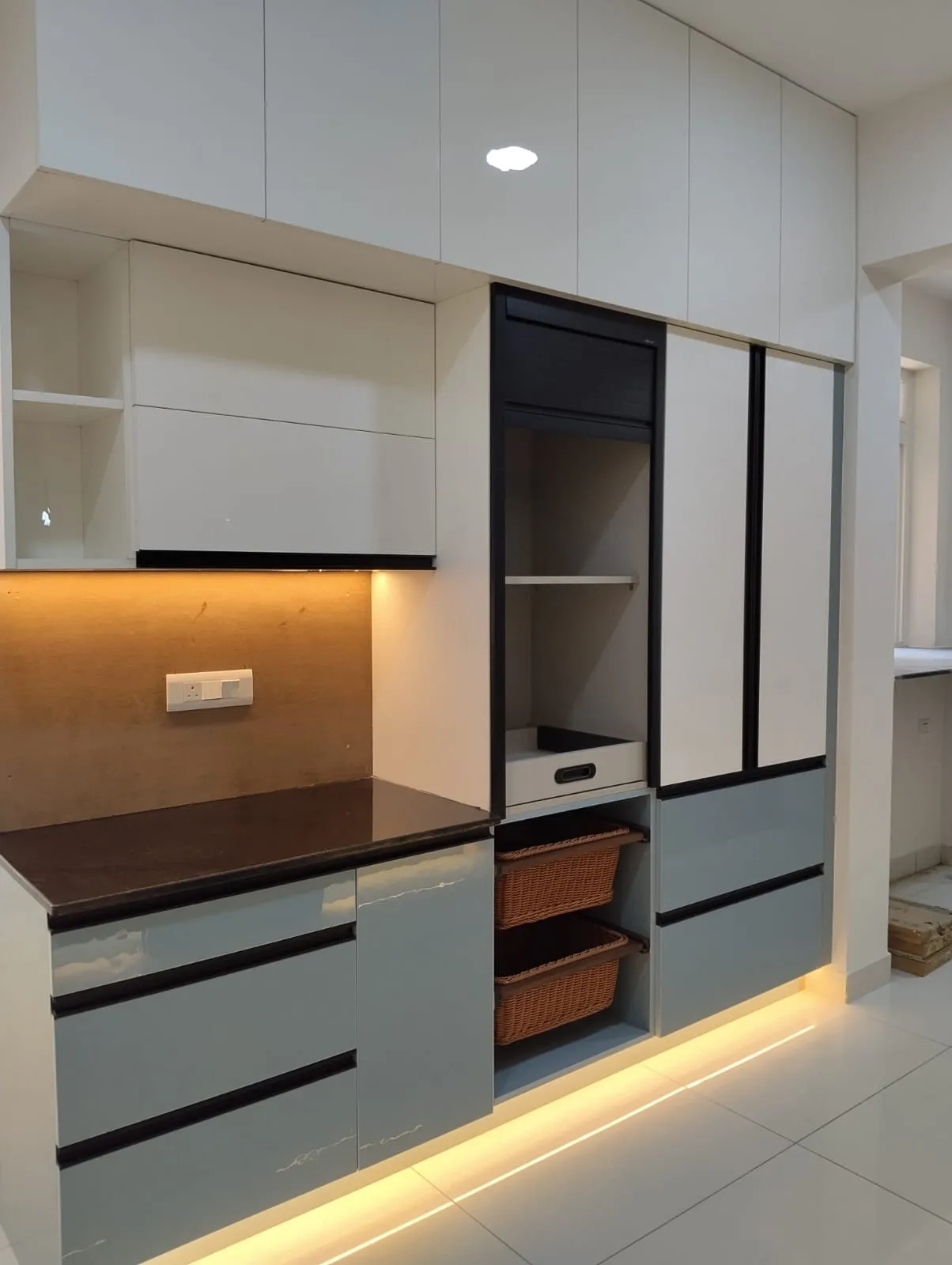 Modern Functional Kitchen Tall Pantry Unit with Integrated Roller Shutter and Ambient Under-Cabinet Lighting | Cabinets & Storage Interior Design by Desk & Decor